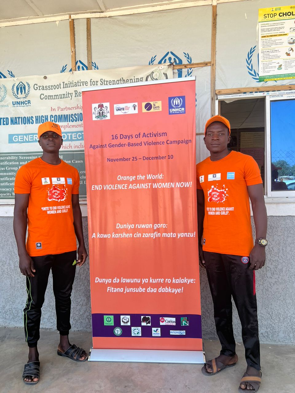 ZAIDF GBV awareness campaign banner and community members